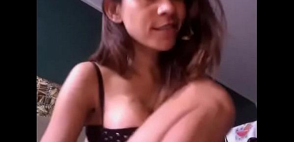  Brazilian girl plays with her pussy